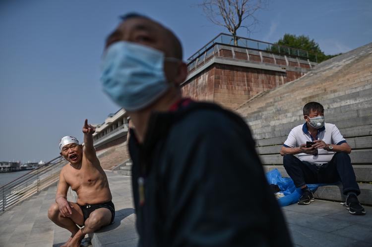 Wuhan ved Yangtze-floden i går. Byen var centrum for udbruddet af den coronaspandemi, som har ramt verden.  Foto: Hector Retamal/Ritzau Scanpix