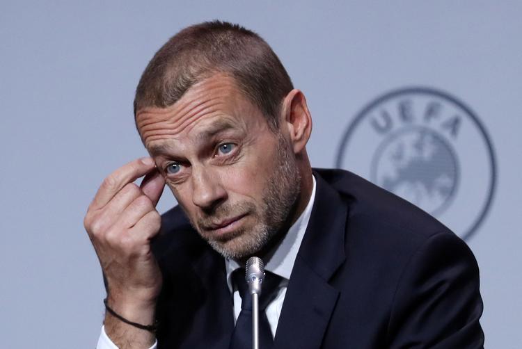 Uefa-chef Aleksander Ceferin håber inderligt, at selv fodbold uden tilskuere kan opmuntre sportens fans.  Foto: Yves Herman/Ritzau Scanpix