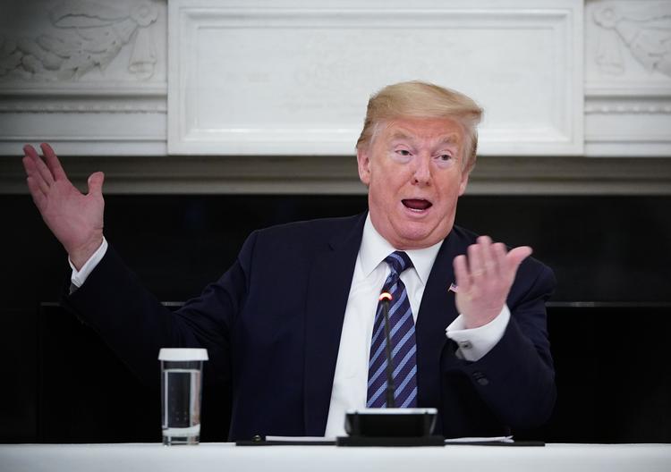  Donald Trump, her i et møde med republikanske kongresmedlemmer, trækker sine folk ud af internationale møder om bekæmpelse af corona-pandemien.  Foto: Mandel Ngan/Ritzau Scanpix