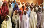 Nogle af de befriede skolepiger, der blev taget af Boko Haram i 2014. Her
ses de 4 år efter, men over 100 er stadig ikke vendt hjem igen. Foto: Azeez Akunleyan/Ritzau Scanpix
