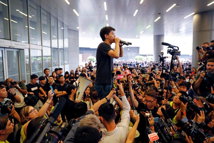 Joshua Wong er blevet et ansigt på kampen for politisk frihed i Hongkong. Allerede som teenager førte han an i masseprotester mod Kina. Foto: Jorge Silva/Ritzau Scanpix