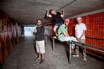 Gigis udgøres af Sorena Sanjari, Malthe Emil Kibsgaard,   Daniel Sanjari, Troels Unneland og Adrian Hosseinpour. Sidstnævnte var ikke til stede, da satirekollektivet blev fotograferet på hjemmebane i Urbanplanen. Foto: Jacob Ehrbahn