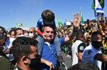 Præsidenten Jair Bolsonaro har deltaget i vælgermøder uden nogen form for værnemiddel. Foto: Evaristo Sa/Ritzau Scanpix