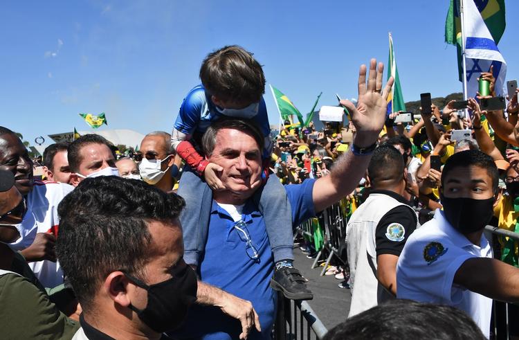 Præsidenten Jair Bolsonaro har deltaget i vælgermøder uden nogen form for værnemiddel. Foto: Evaristo Sa/Ritzau Scanpix