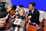 
Zhang Xiaoming, vicedirektør for regeringens Kongkong-kontor, forklarer på et pressemøde indholdet i og konsekvenserne af den nye sikkerhedslov for Hongkong. Foto: Greg Baker/Ritzau Scanpix