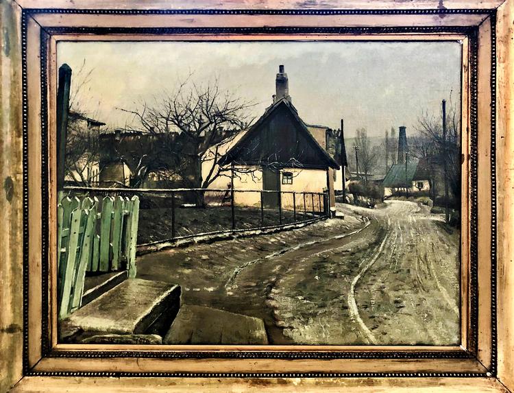 Mellem to gamle chefredaktørportrætter i Jyllands-Postens kælder i Viby stod et L.A. Ring-maleri, sandsynligvis med Brøndgade i Roskilde som motiv. Foto: Privatfoto