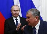 Præsident Putin og hans hidtidige højrehånd, Igor Sjetin ('Ruslands Darth Vader'), er begge rundet af den sovjetiske efterretningstjeneste KGB. Foto: Sergei Karpukhin/Ritzau Scanpix