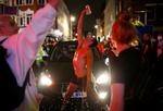 Glade mennesker festede i London-bydelen Soho Foto: Henry Nicholls/Ritzau Scanpix