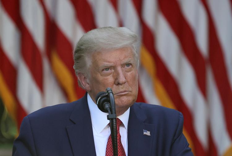 Donald Trump brugte tirsdag på et pressemøde foran Det Hvide Hus situationen i Hongkong til at kritisere Kina og Demokraternes præsidentkandidat, Joe Biden. Foto: Jonathan Ernst/Ritzau Scanpix