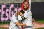 Real Madrids Karim Benzema fejrer en scoring sammen med Sergio Ramos. Foto: Gabriel Bouys/Ritzau Scanpix
