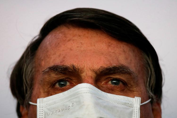Brasiliens præsident Jair Bolsonaro har siden coronavirussens begyndelse været afvist alvoren af sygdommen og samtidig kritiseret de restriktioner, der er blevet lavet for at modvirke smitte.  Foto: Adriano Machado/Ritzau Scanpix