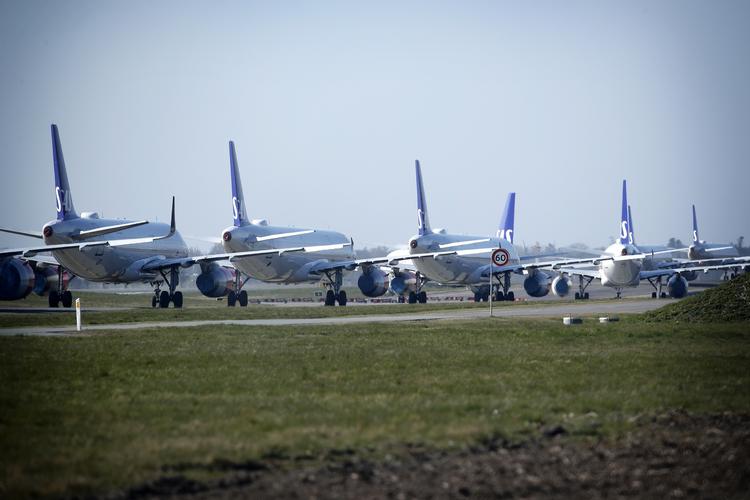 Mange fly har været holdt på jorden pga. coronakrisen. Der ventes at gå flere år, før flytrafikken er normaliseret. Foto: Jens Dresling/POLFOTO
