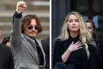 57-årige Johnny Depp og 34-årige Amber Heard foran  The Royal High Court i London i juli måned, mens sagen kørte. Dommen faldt mandag.   Foto: Toby Melville / Simon Dawson / Ritzau Scanpix