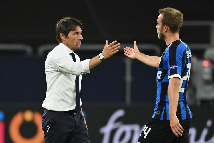 Christian Eriksen (th) har scoret 4 gange i sine 25 første kampe for træner Antonio Contes mandskab.  Foto: Ina Fassbender/Ritzau Scanpix