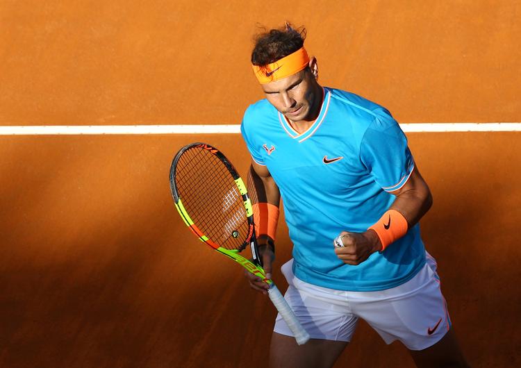 Ni gange har Rafael Nadal vundet den store grusbaneturnering i Rom, og her ses han under sidste års finalesejr over Novak Djokovic. Foto: Stringer/Ritzau Scanpix