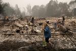   Store områder er brændt ned på den amerikanske vestkyst,  og familier har mistet deres hjem. Foto: Adrees Latif/Ritzau Scanpix