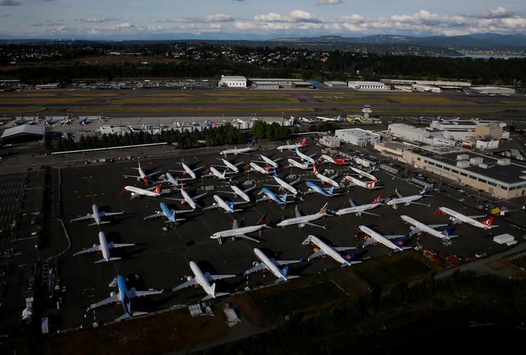 En række Boeing 737 Max fly står parkeret ud for Boeing fabrikken i Seattle, Washington (arkivfoto). Foto: Lindsey Wasson/Ritzau Scanpix