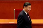 Den kinesiske præsident, Xi Jinping, satser på, at økonomisk fremgang skal få muslimske indbyggere i Xinjiang-regionen til at føle sig som en del af Kina. Foto: Carlos Garcia Rawlins/Ritzau Scanpix