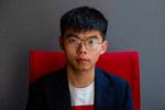 Den 23-årige demokratiforkæmper Joshua Wong er tilsagt til at møde op ved en ret i Hongkong onsdag. Foto: Alastair Pike/Ritzau Scanpix