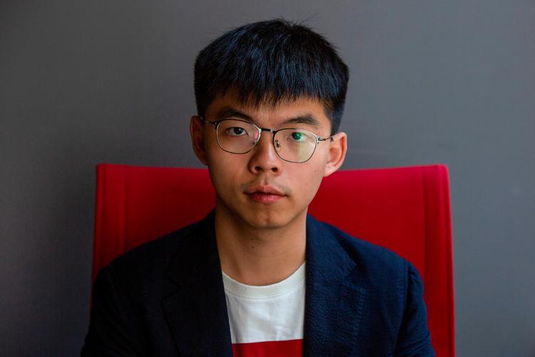 Den 23-årige demokratiforkæmper Joshua Wong er tilsagt til at møde op ved en ret i Hongkong onsdag. Foto: Alastair Pike/Ritzau Scanpix