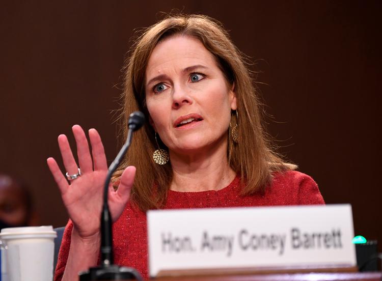 WASHINGTON, DC - OCTOBER 13: Supreme Court nominee Judge Amy Coney Barrett testifies before the Senate Judiciary Committee on the second day of her Supreme Court confirmation hearing on Capitol Hill on October 13, 2020 in Washington, DC. Barrett was nominated by President Donald Trump to fill the vacancy left by Justice Ruth Bader Ginsburg who passed away in September. (Kevin Dietsch-Pool/Getty Images) == FOR NEWSPAPERS, INTERNET, TELCOS &amp; TELEVISION USE ONLY == Foto: Pool/Ritzau Scanpix