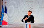 Frankrigs præsident Emmanuel Macron gik onsdag af på tv for at erklære national sundhedskrise og fortælle borgerne, der fra på lørdag indføres natligt udgangforbud i Paris og otte andre storbyer i Frankrig.   Foto: Ludovic Marin/Ritzau Scanpix