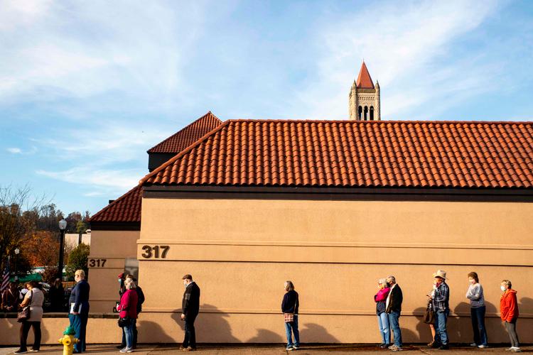Se godt på disse vælgere: Måske er deres stemme ligegyldig.  Det amerikanske valgsystem fører til massivt stemmespil.  Foto: Stephen Zenner/Ritzau Scanpix