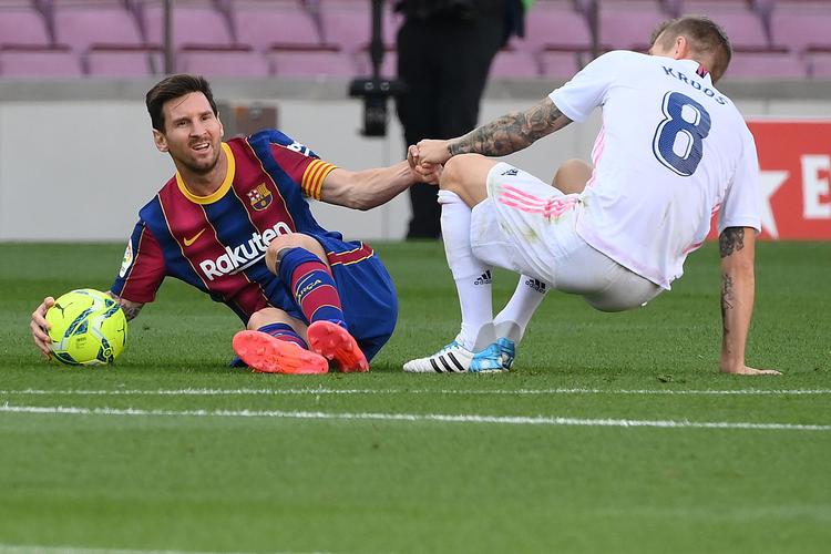 Messi og Toni Kroos var sammen med Sergio Ramos de mest iøjnefaldende spillere i klassikeren.  Foto: Lluis Gene/Ritzau Scanpix