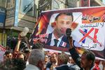 Frankrig og præsident Macron møder protester i store dele af den muslimske verden. Billedet er fra i går i yemens tredjestørste by, Taez. Foto: Str/Ritzau Scanpix