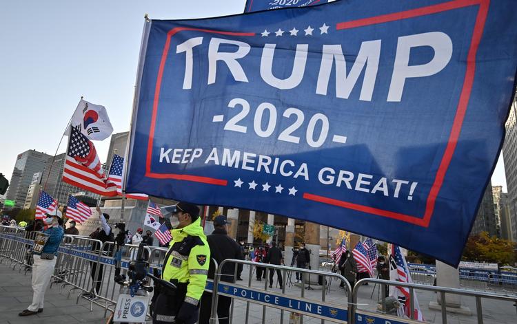 Præsidentvalg. Donald Trump har klaret sig langt bedre end spået i meningsmålingerne. Uden kunne corona havde han måske endda stået til en stor sejr? Foto: Jung Yeon-je/Ritzau Scanpix
