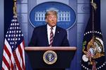 Masser af amerikanere oplevede torsdag aften, at store tv-stationer standsede transmissionen af  præsident Donald Trumps tale fra Det Hvide Hus. Foto: Brendan Smialowski/Ritzau Scanpix