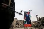 Bashar al-Assad, præsident -- og altfavnende militær diktator i Syrien.  Efter ti års krig har han ikke meget folkelig tilslutning - ifølge mellemøstlig tænketank.  Foto: Ali Hashisho/Ritzau Scanpix