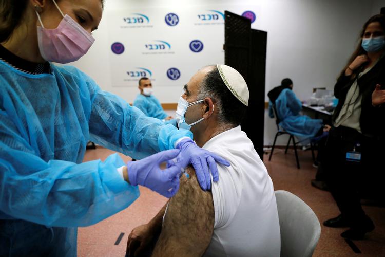 Omkring 150.000 israelere vaccineres - om dagen Foto: Amir Cohen/Ritzau Scanpix