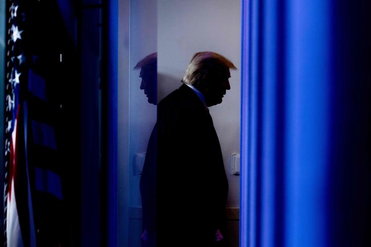 Trump fotograferet 17. April sidste år efter en  briefing om coronavirussen. Foto: Jim Watson/Ritzau Scanpix