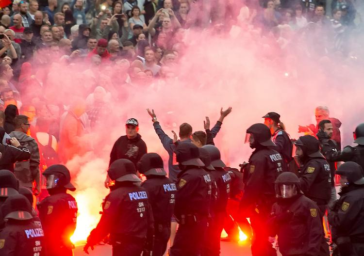 Demonstrationerne i Chemnitz i 2018 udviklede sig voldeligt.  Foto: Jens Meyer/Ritzau Scanpix