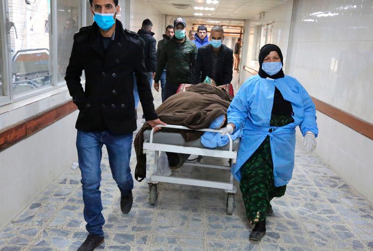 Mindst 32 personer mistede livet i et dobbelt selvmordsangreb i Iraks hovedstad, Bagdad torsdag morgen. Det er det første store selvmordsangreb i byen i tre år. Endnu er det ikke kommet frem, hvem der står bag det.  Foto: Sabah Arar/Ritzau Scanpix