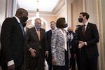     WASHINGTON, DC - JANUARY 21: (L-R) Sen. Raphael Warnock (D-GA), Senate Majority Leader Chuck Schumer (D-NY), Sen. John Hickenlooper (D-CO), Sen. Catherine Cortez Masto (D-NV), Sen. Mark Kelly (D-AZ) and Sen. Jon Ossoff (D-GA) depart a brief press availability with new Democratic Senators at the U.S. Capitol on January 21, 2021 in Washington, DC. Schumer and the Senate Democrats now have a narrow majority in the Senate as they begin the 117th U.S. Congress. Drew Angerer/Getty Images/AFP == FOR NEWSPAPERS, INTERNET, TELCOS &amp; TELEVISION USE ONLY ==   Foto: Drew Angerer/Ritzau Scanpix