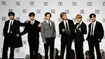K-popbandet BTS, som ses på billedet, fik lavet en karikatur på et samlekort, som nu er trukket tilbage efter kritik om racisme.  Foto: Heo Ran/Ritzau Scanpix