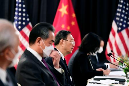 Kinas udenrigsminister, Wang Yi, afviser de amerikanske anklager. Foto: Pool/Ritzau Scanpix