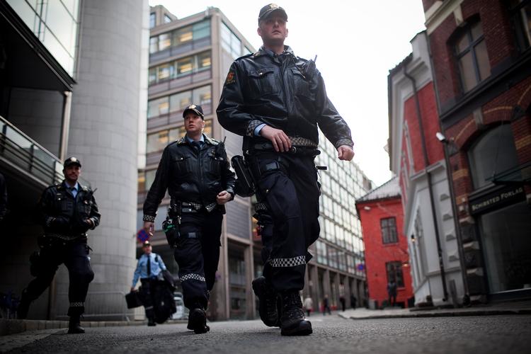 Betjente ved tingretten i Oslo, der kommer til at høre sagen om en ung mands brændende ønske om at få terrorangreb til at ramme danskerne. Arkivfoto. Foto: Lars Just/POLFOTO