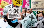 Japanske borgere protesterer mod regeringens beslutning om at udlede radioaktivt vand i Stillehavet. Foto: /Ritzau Scanpix
