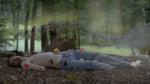 Kim Richard Adler Mejdahls naturfællesskaber er magiske på en måde, hvor der i den grad er plads til monstre. Og morsende møl!  Foto: Stillbillede fra videoprojektion med kunstneren syngende i skovbunden