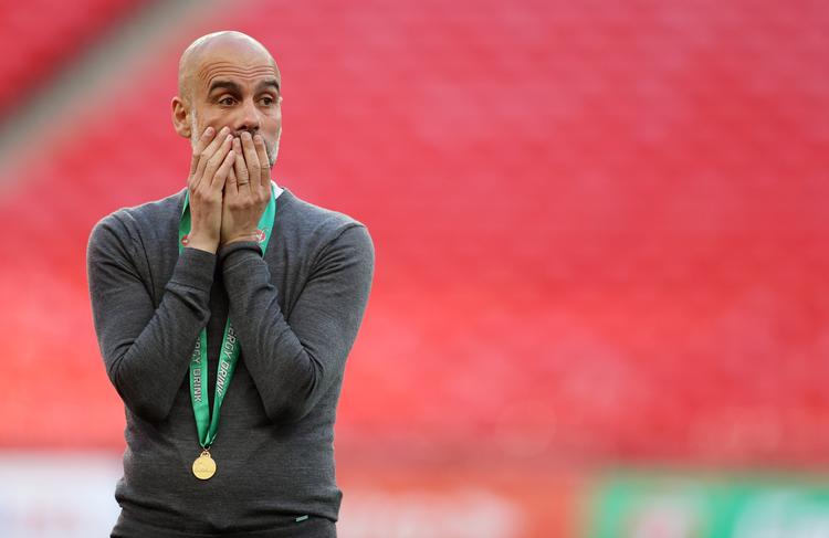 Pep Guardiola vandt i søndags endnu en titel, da City slog Tottenham i Liga Cup-finalen. Drømmen er at vinde Champions League med den engelske klub.   Foto: Carl Recine/Ritzau Scanpix