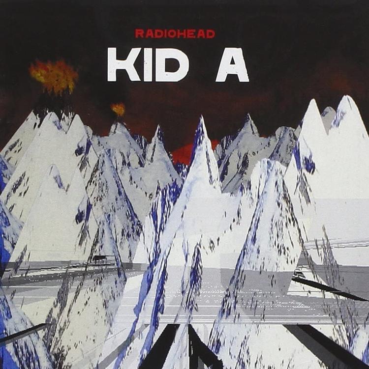 Stanley Donwood brugte blandt andet knive til at male albumcoveret, der med sit dystopiske landskab af pyramideagtige isbjerge, ild og sort himmel perfekt fangede stemningen på 'Kid A'. 
