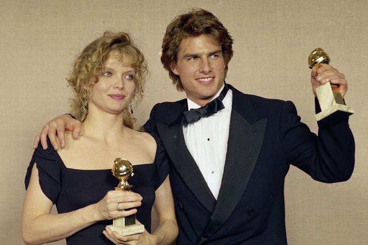 Tom Cruise vandt en af sine Golden Globes i 1990 for hovedrollen i 'Født den 4. juli'. Senere vandt han også   Golden Globe-statuetter for rollerne i 'Jerry Maguire' og 'Magnolia'. På billedet ses også Michelle Pfeiffer, der i 1990 vandt en Golden Globe for sin præstation i 'De fabelagtige Baker Boys'.  Foto: Doug Pizac/Ritzau Scanpix