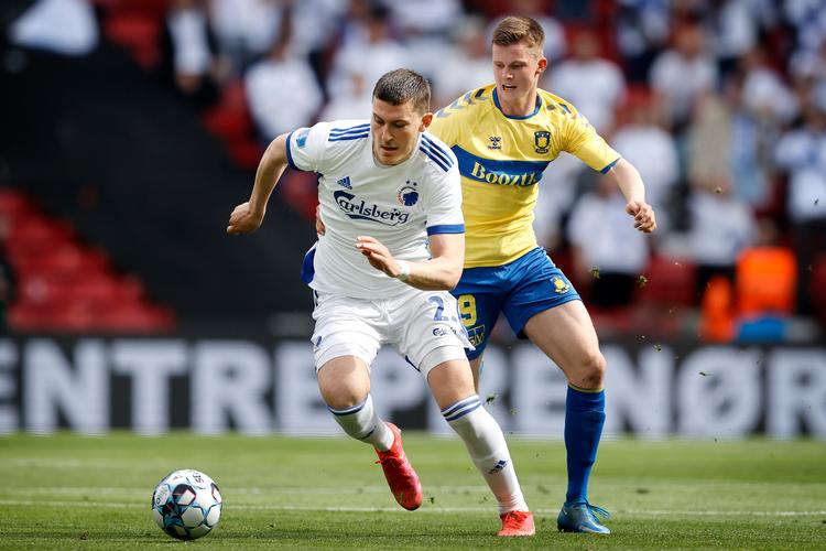 FCK's Jonas Wind, der her er i nærkamp med Morten Frendrup, blev matchvinder.   Foto: Jens Dresling/POLFOTO