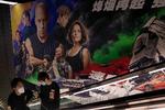 En biografreklame for filmen 'Fast &amp; Furious 9' uden for en biograf i Beijing. En af de medvirkende, John Cena, var lidt hurtig i replikken – og gjorde Kina rasende.   Foto: Ng Han Guan/Ritzau Scanpix
