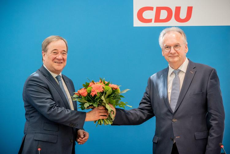 CDU-leder Armin Laschet har meget at takke den siddende ministerpræsident i Sachsen-Anhalt,  Reiner Haseloff, for. Foto: Pool/Ritzau Scanpix