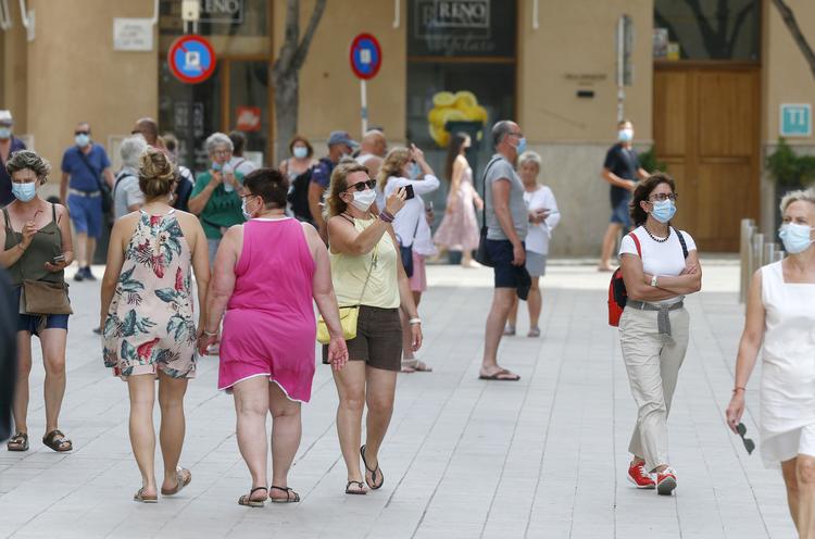 I takt med, at rejserestriktioner lempes, kommer turisterne tilbage som her på Mallorca, men mange danskere er fortsat utrygge ved at rejse udenlands.  Foto: Enrique Calvo/Ritzau Scanpix