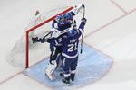     TAMPA, FLORIDA - JUNE 25: Andrei Vasilevskiy #88, Brayden Point #21 and Victor Hedman #77 of the Tampa Bay Lightning celebrate after defeating the New York Islanders 1-0 in Game Seven of the NHL Stanley Cup Semifinals during the 2021 NHL Stanley Cup Finals at Amalie Arena on June 25, 2021 in Tampa, Florida. Mike Carlson/Getty Images/AFP == FOR NEWSPAPERS, INTERNET, TELCOS &amp; TELEVISION USE ONLY ==   Foto: Mike Carlson/Ritzau Scanpix